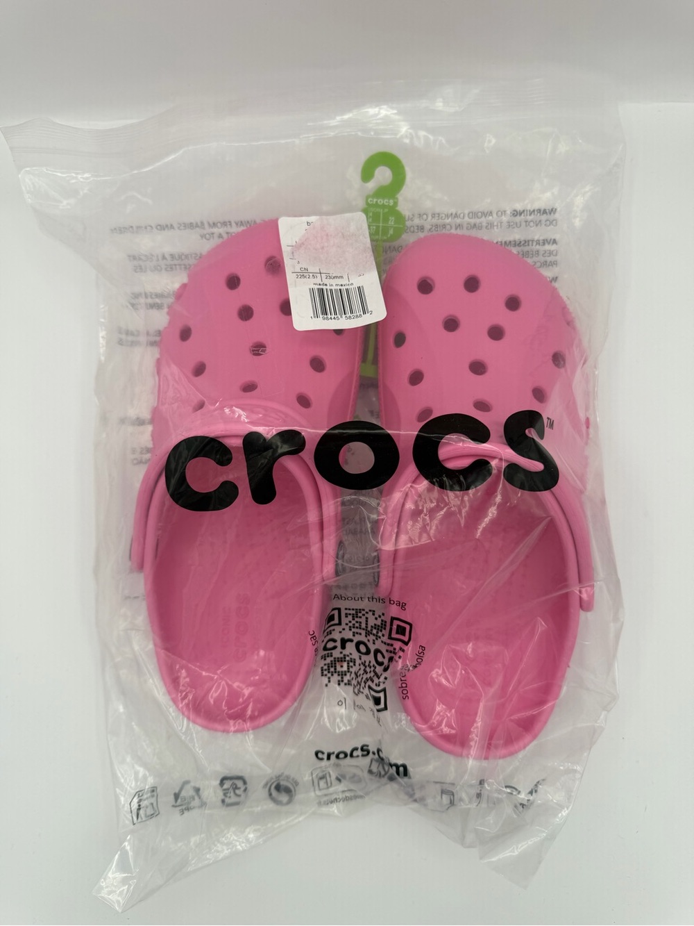 CROCS Kids Classic Clogs in Hot Pink